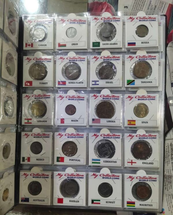 Collectible album of 100 different foreign coins - Image 3